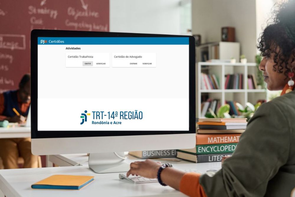 A imagem mostra uma mulher trabalhando no computador